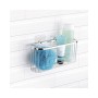 Panier ovale en acier inoxydable pour salle de bain.